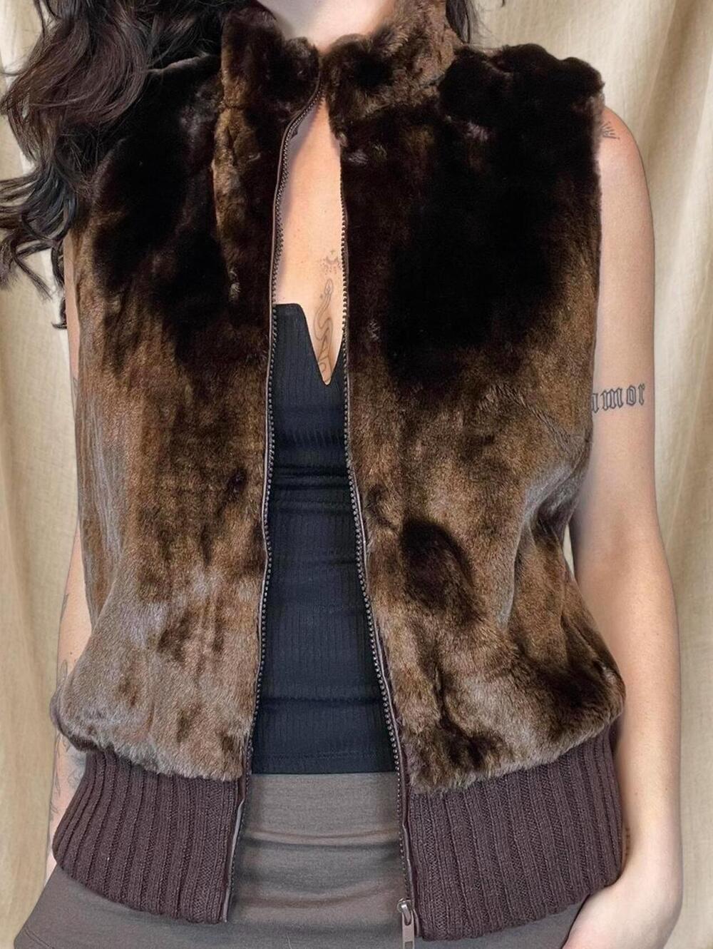 Brown faux fur vest with zipper closure and ribbed knit waistband